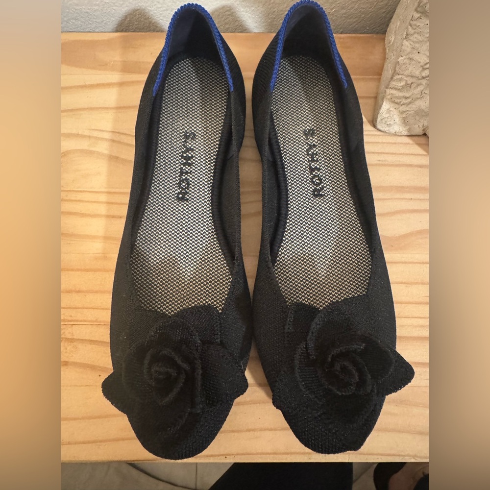 Rothy's Black Flats with Rose Accent Machine Washable